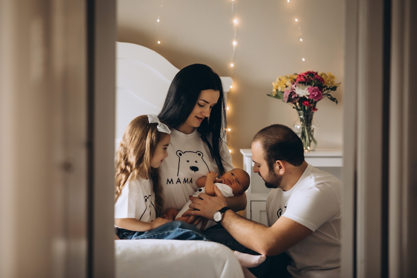 Family gathered around a newborn — Pittsburgh newborn photography by Valeria Badiu