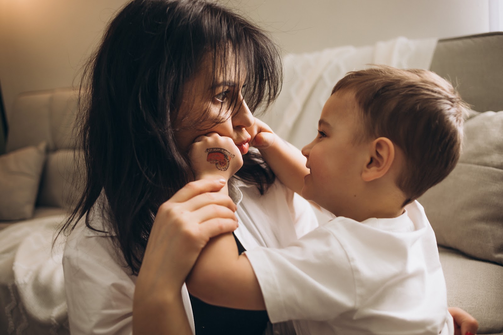 Mother holding son in dynamic outdoor portrait — Pittsburgh family photography by Valeria Badiu